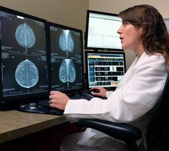 doctor analyzing the results of a 3d mammogram