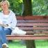 woman thinking about a bone density scan on a park bench
